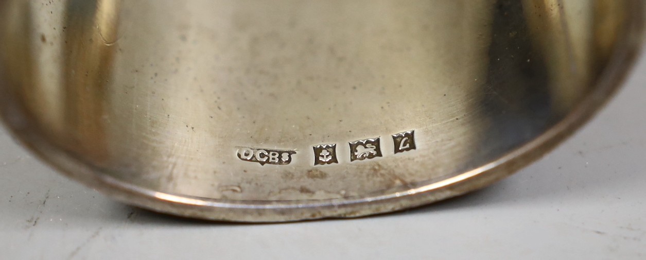 Six assorted silver napkin rings including a pair, Birmingham, 1913.